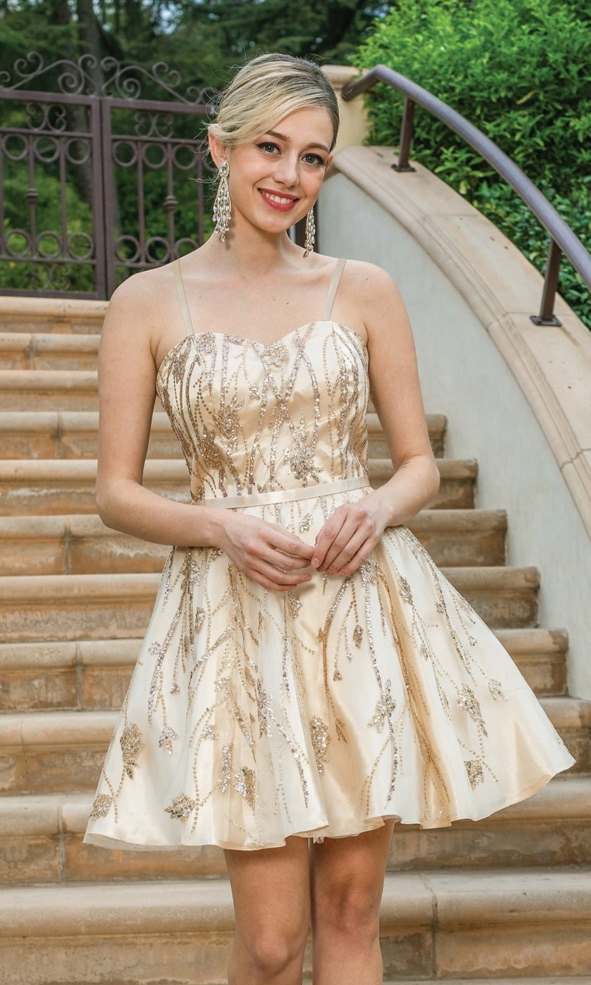 A woman wearing the Glitter-Print A-Line Short Homecoming Dress stands on outdoor stone steps, smiling at the camera.